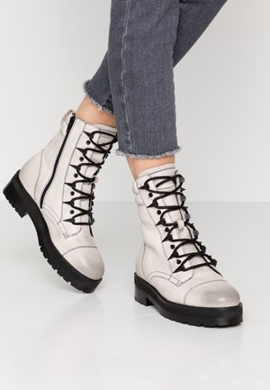 Stivaletti con plateau - white
