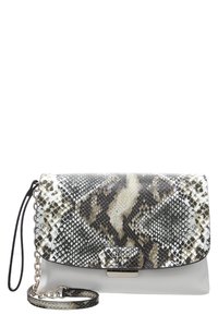 Snake-print clutch bag in shades of black, white, and gray; features a smooth cream-colored base, chain strap, and metallic logo accent.
