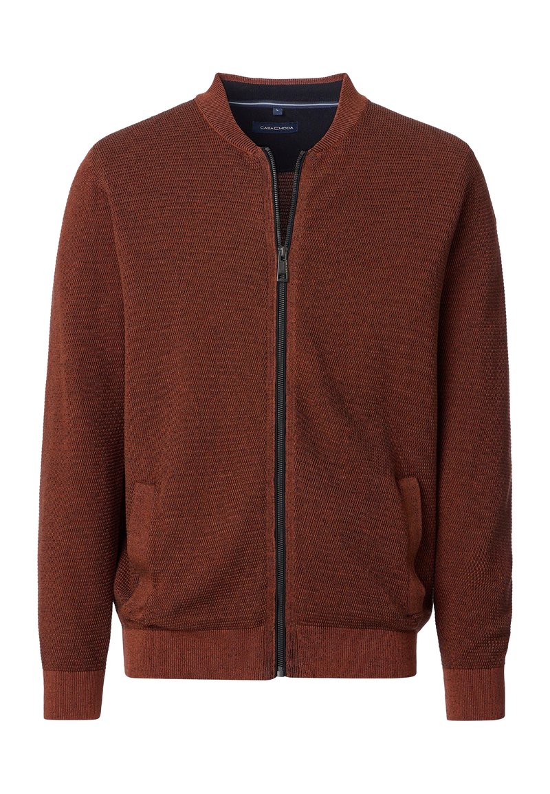 Rostfärgad bomberjacka med dragkedja fram, ribbade ärmar och två sidofickor. Strukturerad tyg med en enfärgad design.