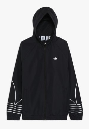 Veste à capuche zippée noire Adidas avec logo trefoil blanc sur la poitrine et bandes graphiques blanches sur les manches.