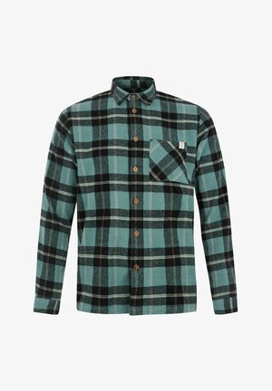 Camisa de franela a cuadros en verde azulado y negro, con un cierre de botones en la parte delantera, mangas largas y un bolsillo en el pecho con un patrón diagonal.