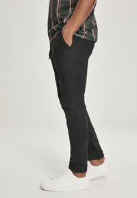 Southpole STRETCH JOGGER  - Treniņtērpa apakšdaļas - black