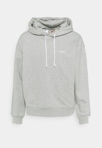 Felpa grigia in cotone con cappuccio con cordino, tasca frontale e piccolo logo bianco di Levi's sul petto. Texture morbida e vestibilità rilassata.