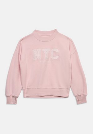 Light pink crewneck sweatshirt with ribbed cuffs and hem, featuring large white "NYC" text on the chest.