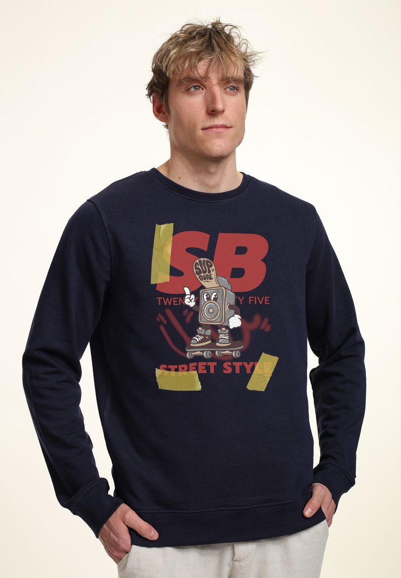 Felpa blu navy con una grafica audace di un personaggio dei cartoni animati con un boombox, accentuata da dettagli gialli in stile nastro. Materiale misto cotone.