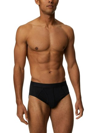 Sorte briefs i stil med bred elastik, enkelt design og subtile syninger, vist på en mandlig model.