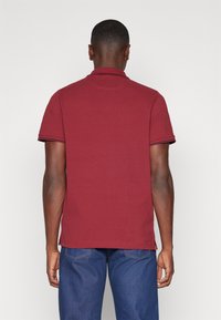 GANT Polo marškinėliai - plumped red