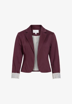 Viininpunainen bleiseri jämäkällä muotoilulla, jossa on pitkät hihat ja raidallinen valkoinen vuori. Hihansuut on käännetty ylös, jolloin raidoitettu kuvio näkyy.