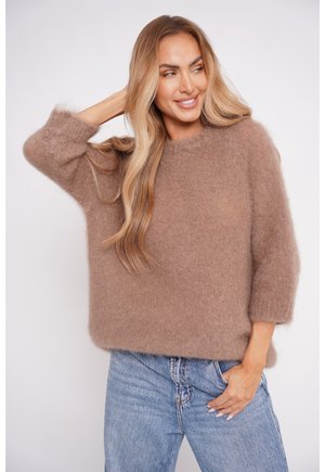 - Sweter