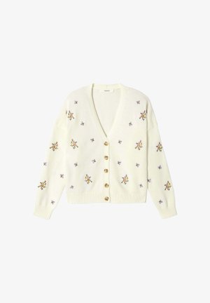 Cardigan crème avec boutons en bois et petites broderies florales violettes et jaunes dispersées sur le devant et les manches.
