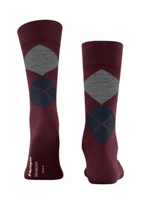 Calcetines color burdeos con un patrón de diamantes en gris y azul marino, acentuados con costuras naranjas. Tejido suave con puños acanalados.