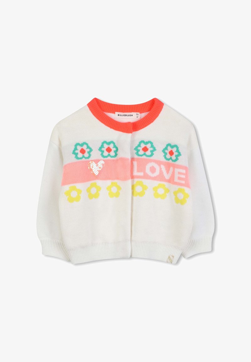 Λευκό πλεκτό cardigan με κοραλλί γιακά, διακοσμημένο με λουλούδια σε πράσινο, κίτρινο και ροζ χρώμα, και τη λέξη "ΑΓΑΠΗ" σε ροζ κείμενο.
