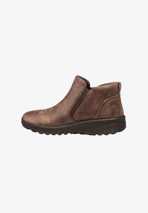 Stivaletti marroni in suede con pannelli laterali elastici e tacco basso. Presentano una punta arrotondata e una superficie testurizzata per una migliore presa.