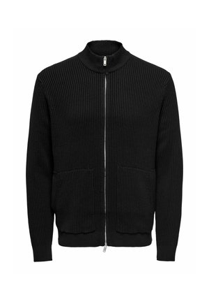 Gilet zippé noir à côtes avec un col haut, deux poches avant et des poignets ajustés. Fabriqué en maille texturée.