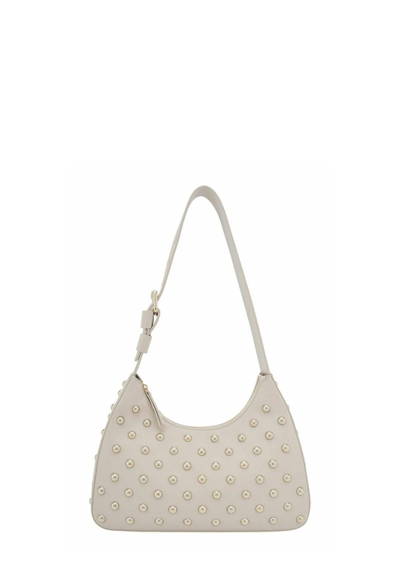 Sac épaule beige clair avec une finition en cuir lisse, orné d'un motif de clous circulaires et d'une seule bandoulière.