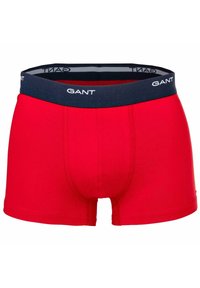 Boxer shorts rossi in cotone con un elastico blu navy in vita, dotati di branding GANT, progettati con una forma aderente e una consistenza morbida.