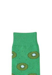 Calcetines verdes con un patrón de kiwi, que presentan círculos marrones y centros blancos, hechos de una tela suave y elástica. Textura lisa.