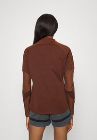 Nike Performance WINTERIZED - Sweatshirt - bronze eclipse/redstone/total orange