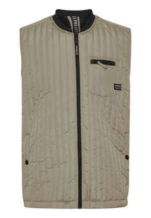 Chaleco beis acolchado con cierre de cremallera negra y cuello. Cuenta con un bolsillo lateral con cremallera y un pequeño logo en el pecho.