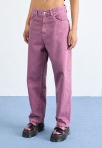 Carhartt WIP BRANDON PANT - Jeans relaxed fit - dusty fuchsia