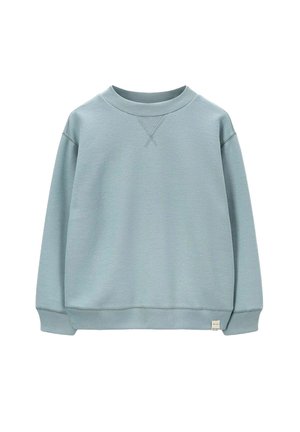 Sweatshirt bleu clair avec col rond, manches longues et poignets côtelés. Présente une finition texturée et une petite étiquette de marque sur l'ourlet.