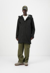Helly Hansen MUNICH RAIN COAT UNISEX - Parka - black