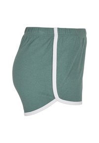 Green athletic shorts with white trim and elastic waistband, shown from the side on a white background.