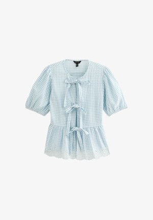 Ljusblå rutig blus med korta puffärmar, rundad halsringning, tre framknutar och broderade detaljer i nederkant.