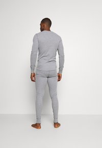 ODLO BOTTOM LONG ACTIVE WARM - Camada base - grey melange