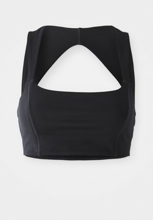 Mustan urheilbra, jossa on korkea kaula-aukko, avoin selkäosa ja näkyvät ompeluyksityiskohdat. Valmistettu mukavasta, joustavasta materiaalista.