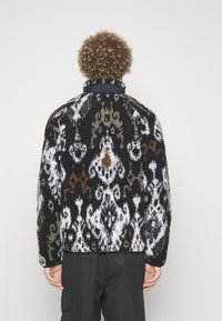 Carhartt WIP PRENTIS LINER - Jachetă din fleece - baru/black