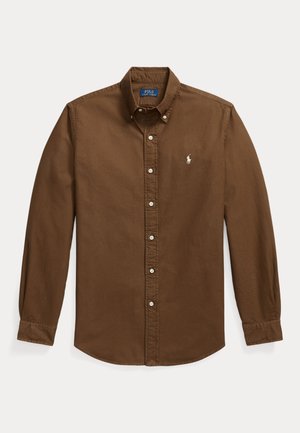 Καφέ πουκάμισο με μακριά μανίκια και κουμπιά, γιακά και λευκό κεντημένο λογότυπο Polo Ralph Lauren στο αριστερό στήθος.