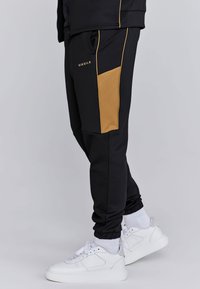 SIKSILK MUSCLE FIT JOGGERS - Tracksuit bottoms - black