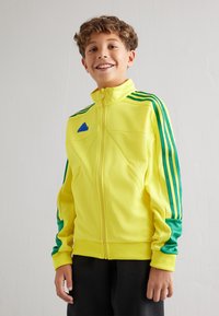 adidas Performance TIRO NATIONS PACK UNISEX - Chaqueta de entrenamiento - bright yellow/bold green/bold blue