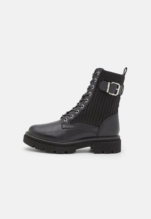 Bottines à plateau - black