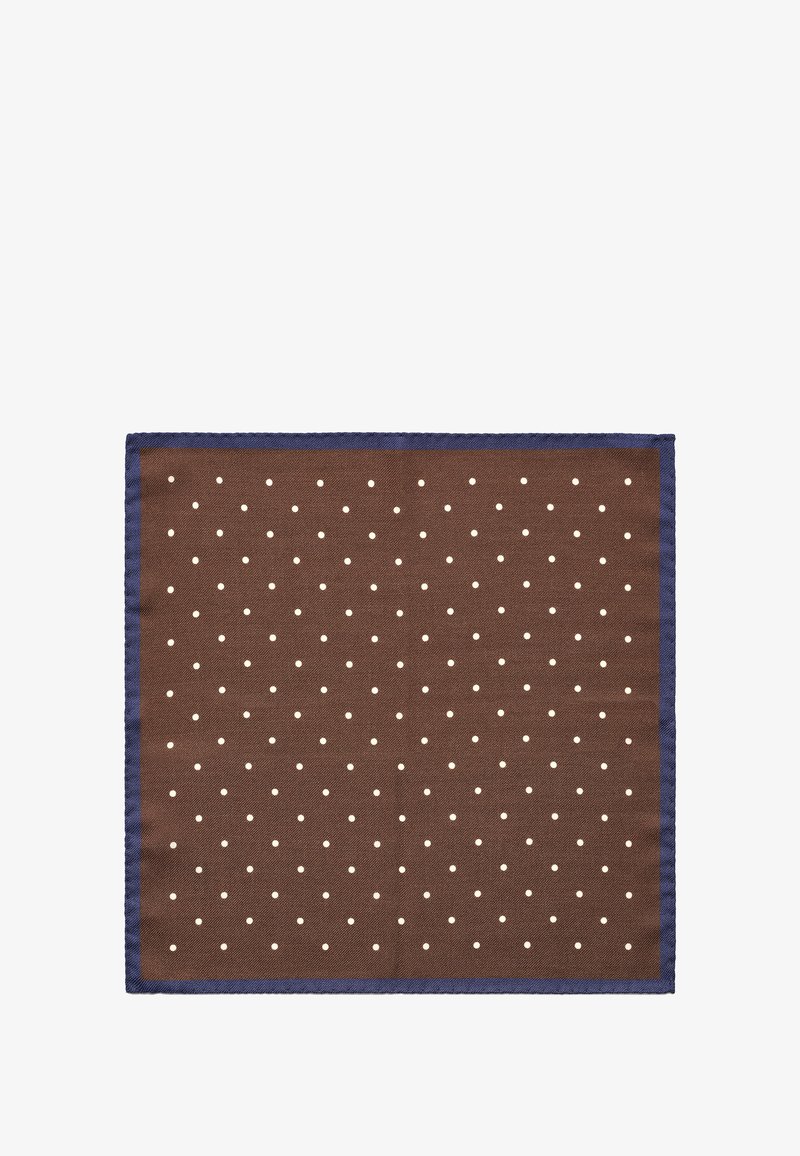 Ruskea kangasneliö, jossa on valkoisia pilkkuja ja tummansininen reunus. Materiaali vaikuttaa teksturoidulta ja kudotulta. Mitat eivät ole tiedossa.