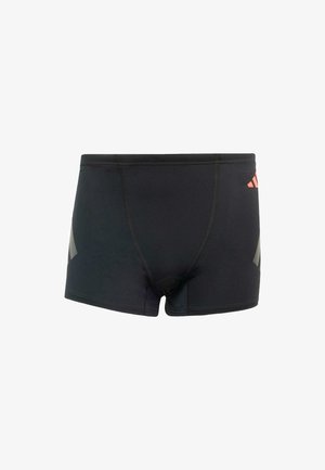 Crne kupaće hlačice s pripijenim dizajnom, sivoj bočnoj ploči i crvenim logotipima. Napravljene od rastezljivog, glatkog materijala.