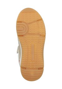 Sneakerzool met een getextureerd rubberontwerp, in een lichtbruine kleur, met golvende patronen en een cirkelvormig logo gedrukt in de bodem.