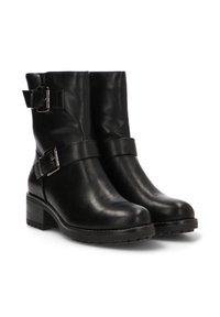 Botas de cuero negro hasta el tobillo con punta redondeada, hebillas laterales y un tacón bajo con bloque y suela de goma texturizada para mayor tracción.