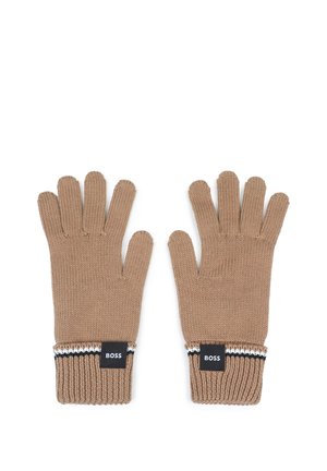 Gants en tricot beige avec des poignets côtelés ornés de bandes noires et blanches ainsi que des étiquettes noires portant la mention BOSS sur fond blanc.