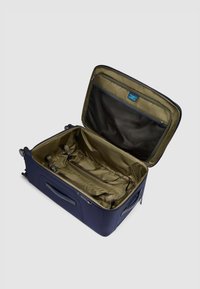 Marineblaue Rollreisetasche mit geräumigem Innenraum, olivgrünem Futter, verstellbaren Gurten und einem Reißverschlussnetzfach im Deckel.