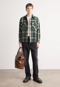 Calvin Klein Jeans Šněrovací kotníkové boty - dark brown