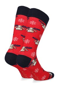 Czerwone bawełniane skarpetki z granatowymi mankietami; wzory z reniferami i śnieżynkami; miękka tekstura; wzmocniony palec i pięta dla większej trwałości.