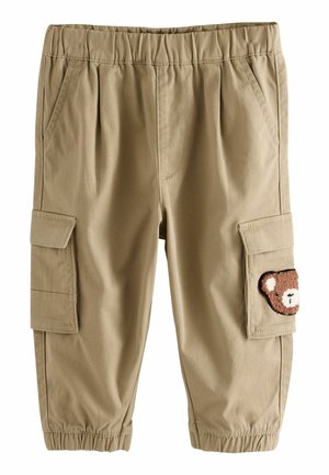 Pantaloni cargo khaki con una cintura elastica, tasche laterali e una patch decorativa a forma di orso marrone sulla gamba destra. Materiale morbido e resistente.