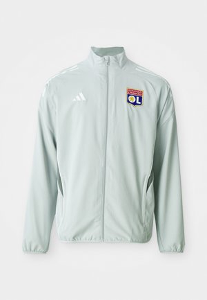 Hellgrüne Sportjacke mit Stehkragen, ausgestattet mit weißen adidas-Streifen und einem Logo von Olympique Lyonnais auf der linken Brust.