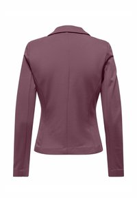 Jakke som sitter godt laget av strukturert stoff i mauve, med lange ermer og en klassisk spiss krage med sømløst bakdesign.