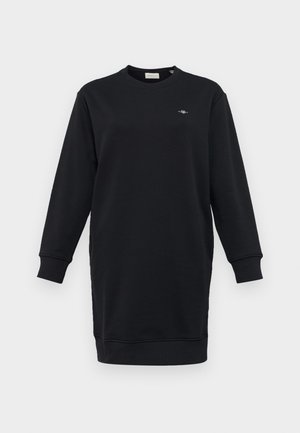 Must mustaga dress pikkade varrukatega, ümmarguse kaelusega, ribadega mansettide ja väikese tikandiga logoga rinnal. Sujuv kangatekstuur.