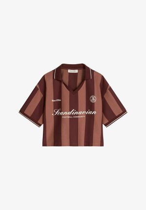 Short-sleeve, cropped football shirt with vertical brown stripes, "Scandinavian Football Community" text, and Marc O'Polo branding.