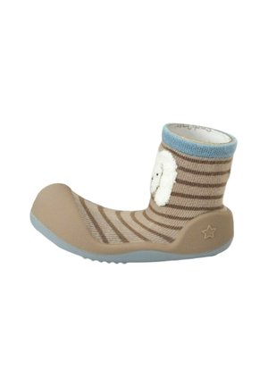 Zapato-zapatilla de calcetín para niño pequeño a rayas beige y marrón, con puño azul, suela de goma y cara de oveja blanca en el lateral.