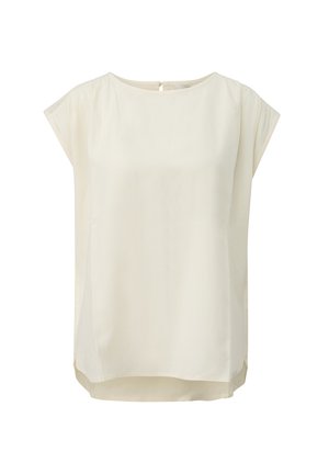 Blouse de couleur crème en tissu lisse. Présente un col rond, des manches courtes et une fermeture au dos. Design simple et minimaliste.